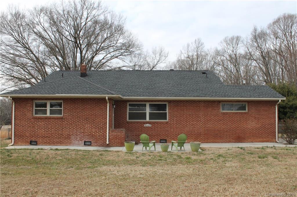 4335 Beaty Road Gastonia, NC 28056 - Photo 1 of 22 a house that has a tree in front of it