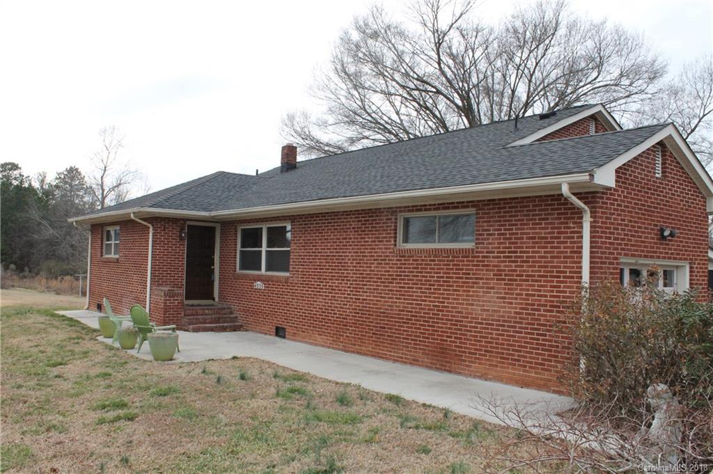 4335 Beaty Road Gastonia, NC 28056 - Photo 2 of 22 a view of a house with a yard