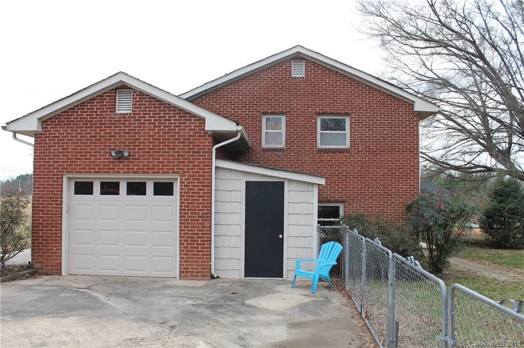 4335 Beaty Road Gastonia, NC 28056 - Photo 3 of 22 a front view of a house with a yard