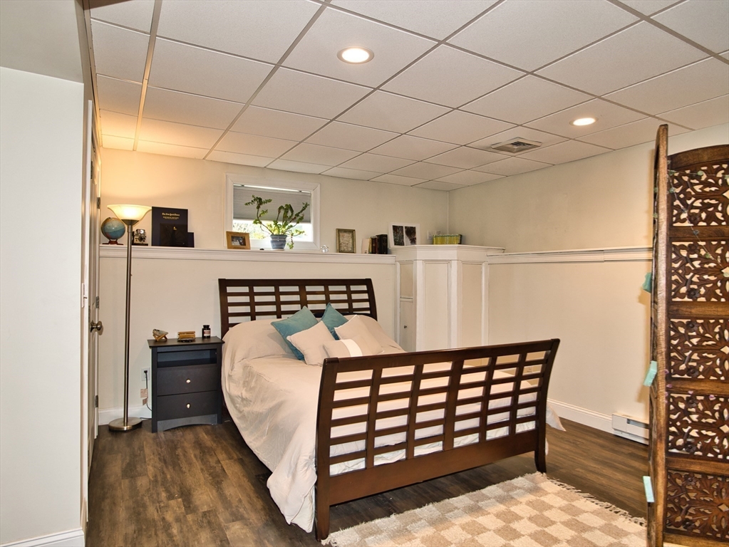 9 Brookfield Lane Bellingham, MA 02019 - Photo 34 of 40 a bedroom with furniture and a window