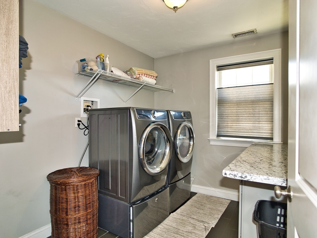 9 Brookfield Lane Bellingham, MA 02019 - Photo 39 of 40 a utility room with dryer and washer