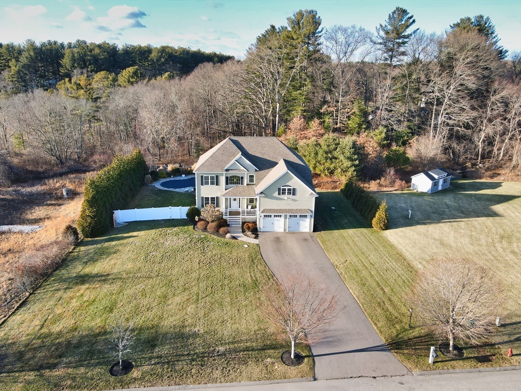 9 Brookfield Lane Bellingham, MA 02019 - Photo 5 of 40 a view of a house with a yard