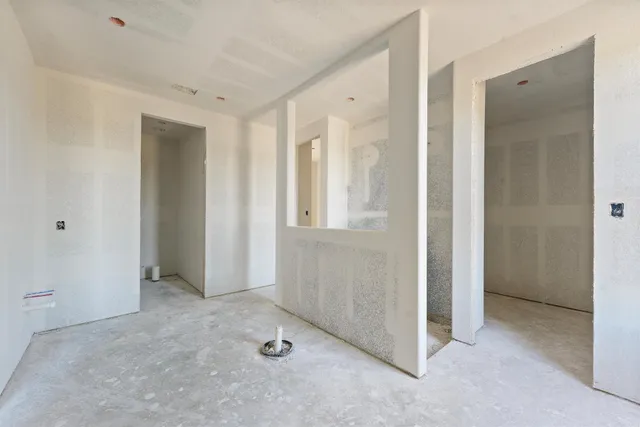 an empty room with windows