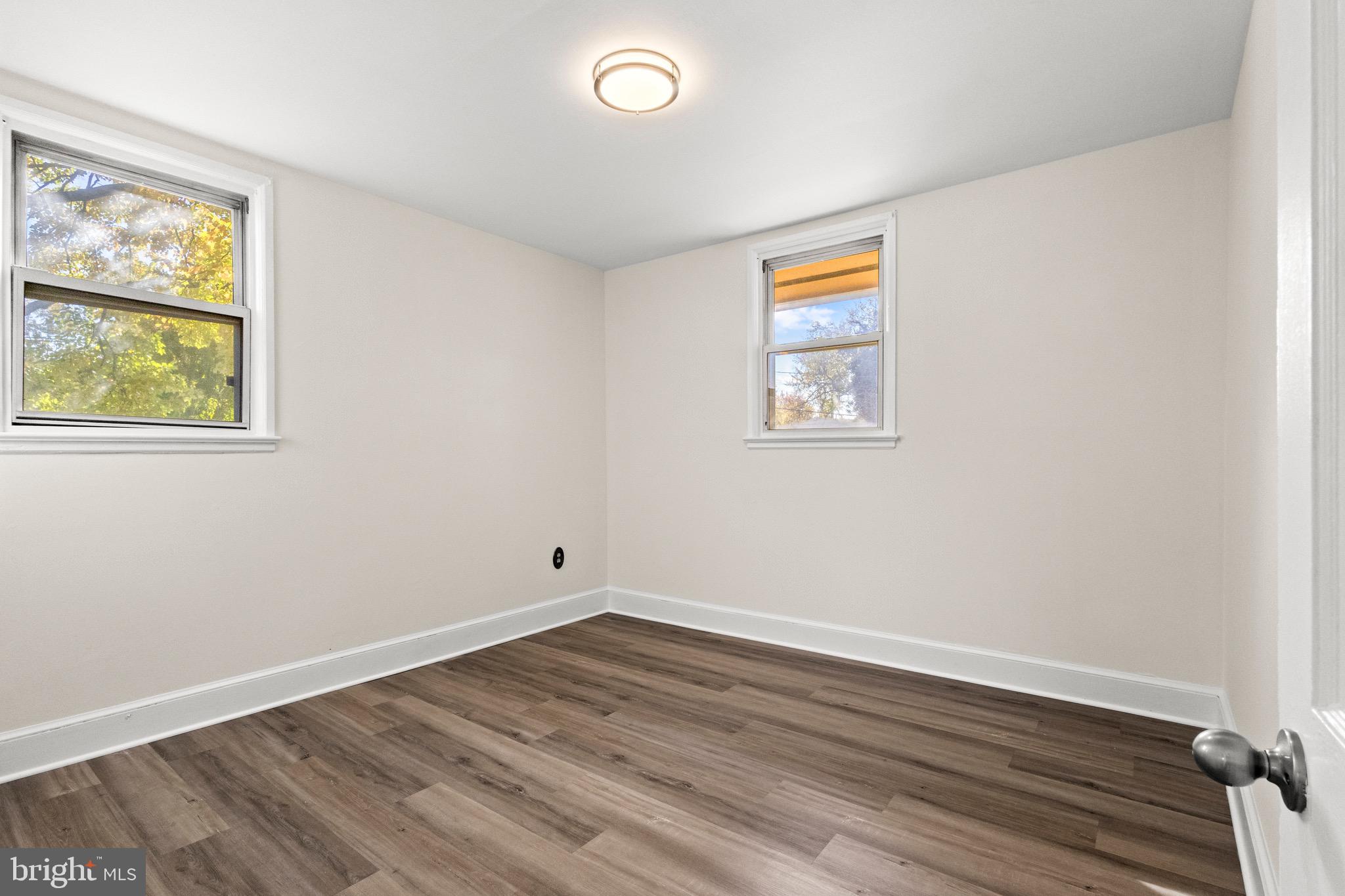 5120 Kenesaw Street College Park, MD 20740 - Photo 19 of 37 an empty room with wooden floor and window