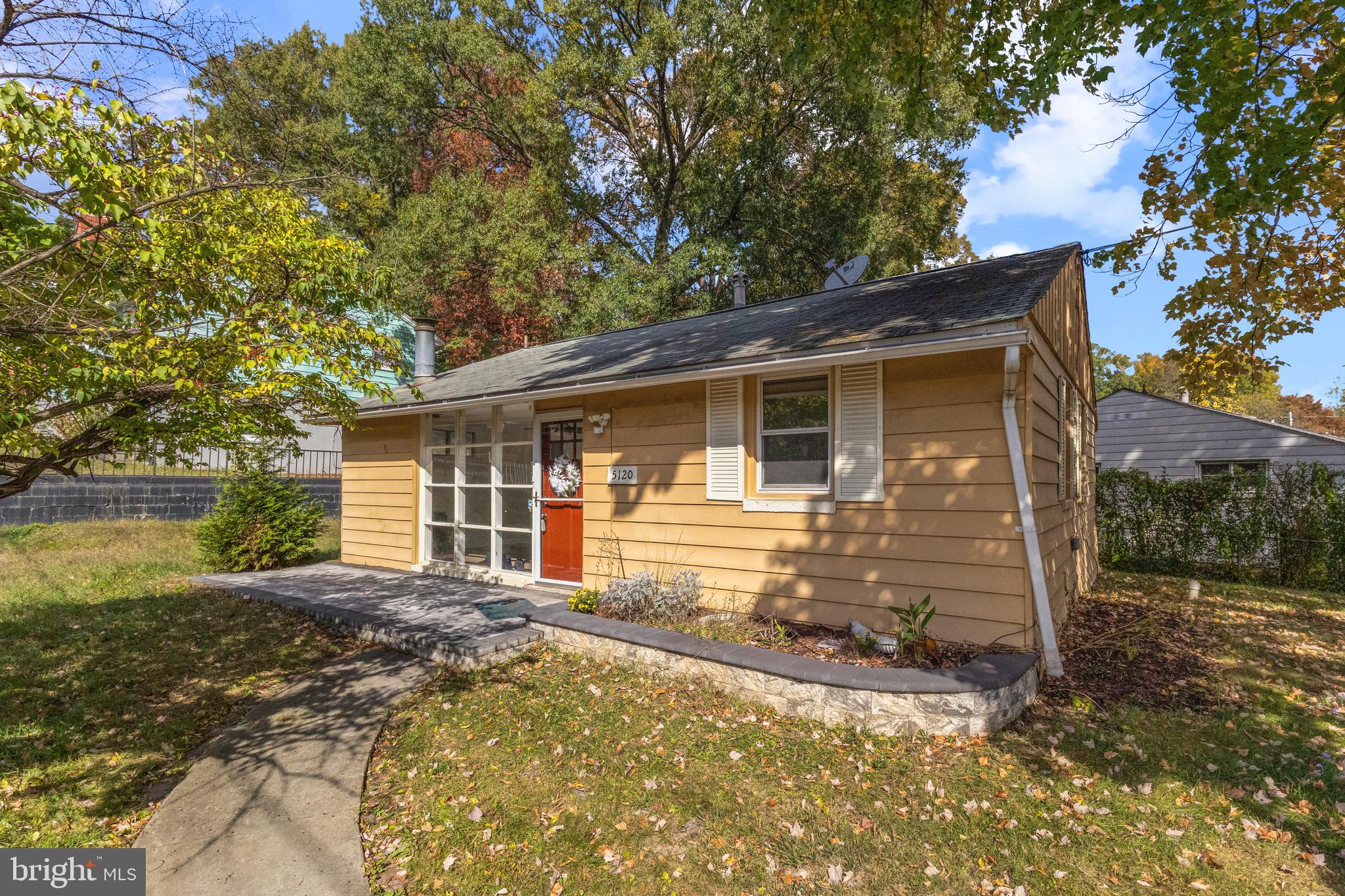 5120 Kenesaw Street College Park, MD 20740 - Photo 2 of 37 a front view of a house with a yard