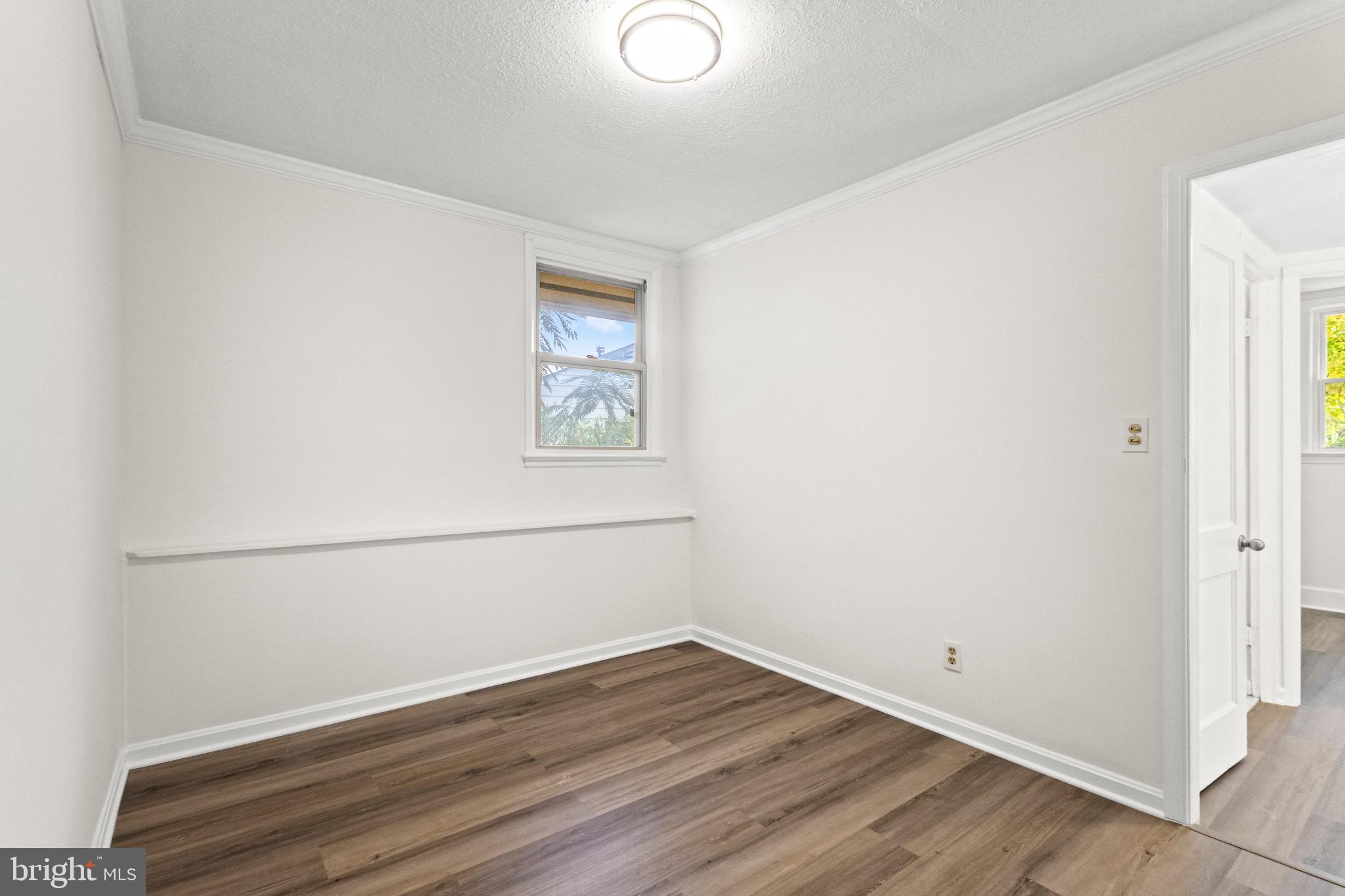 5120 Kenesaw Street College Park, MD 20740 - Photo 25 of 37 a view of a room with wooden floor and window