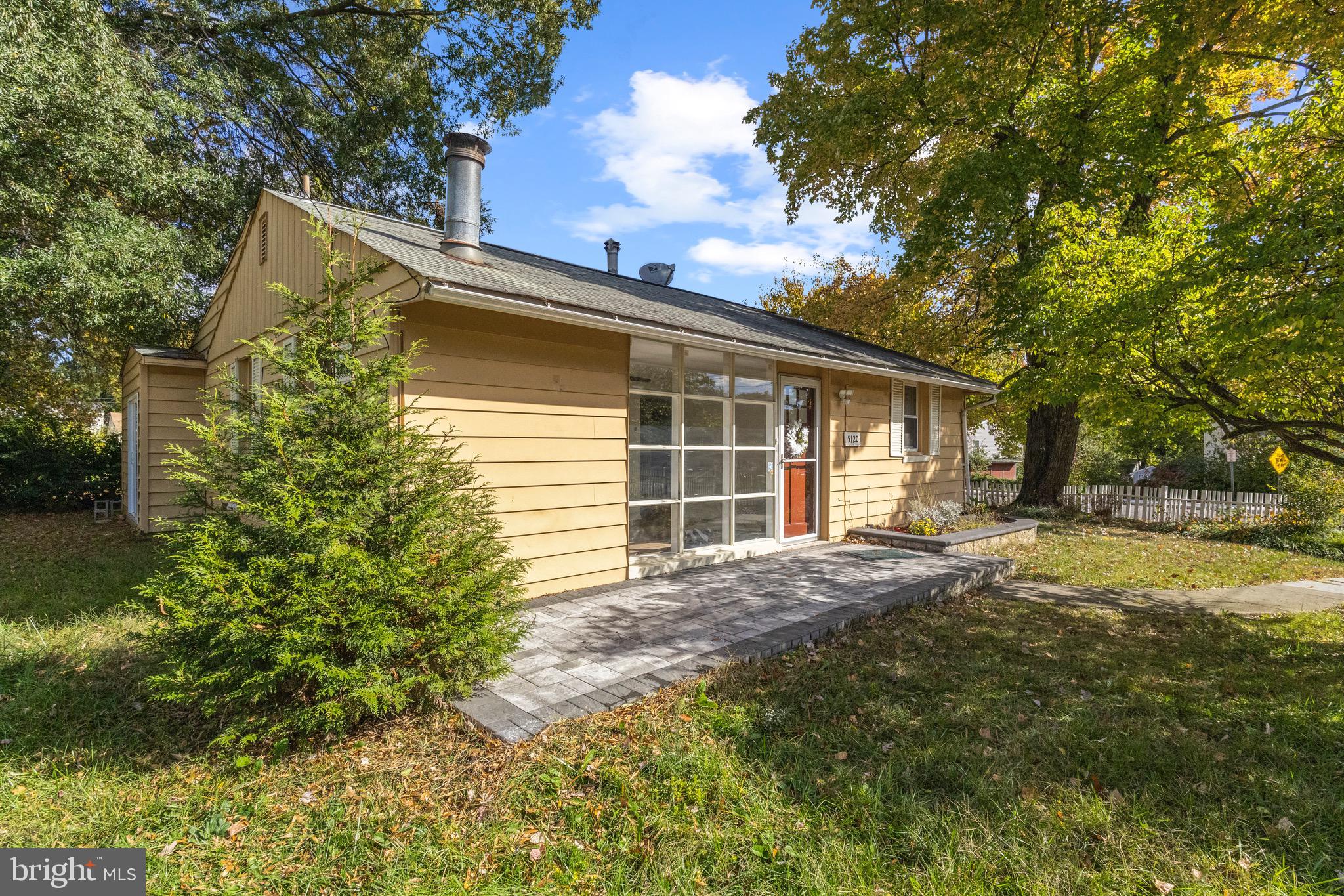 5120 Kenesaw Street College Park, MD 20740 - Photo 31 of 37 a view of a house with a yard and garage
