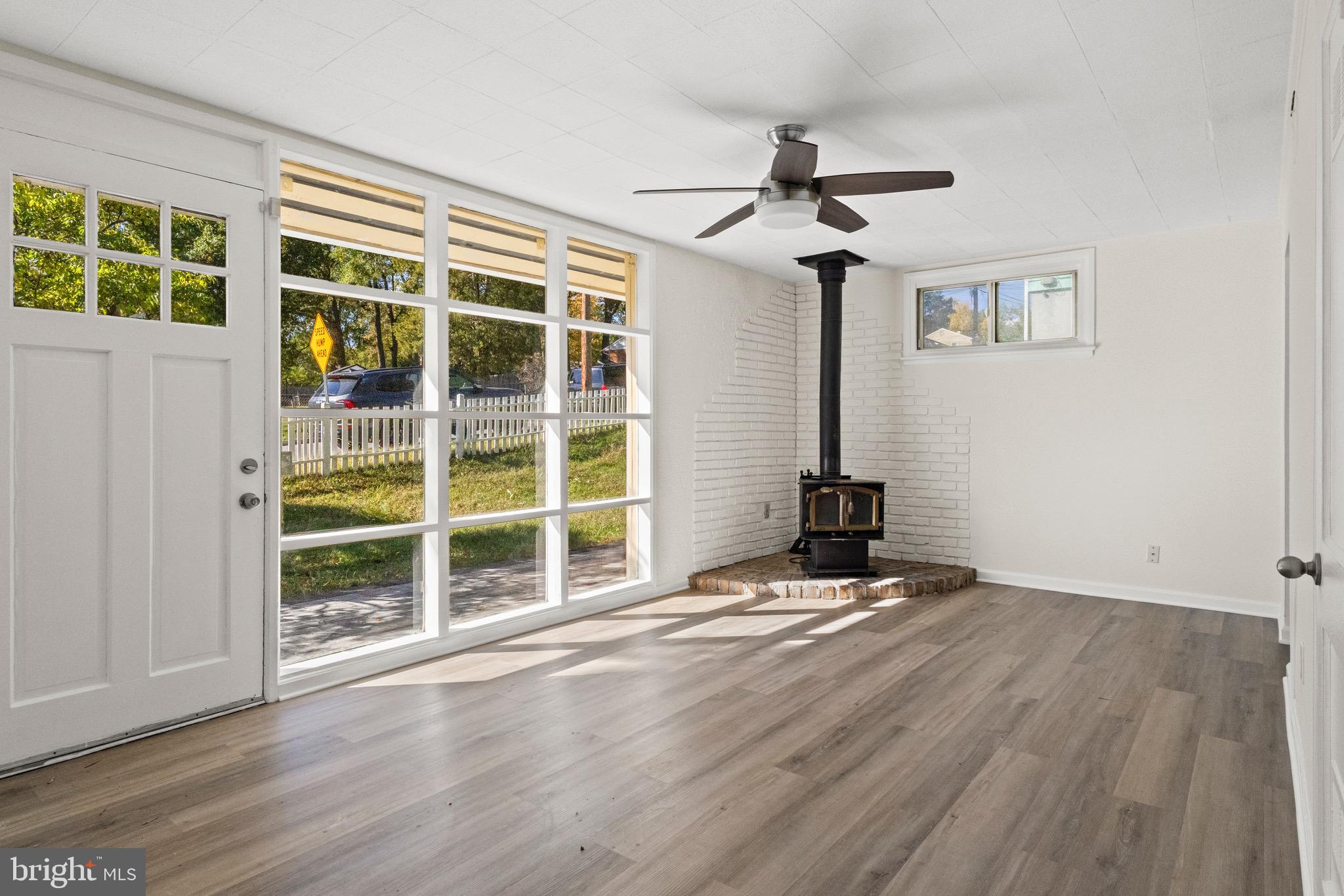 5120 Kenesaw Street College Park, MD 20740 - Photo 6 of 37 a view of an empty room with a window and wooden floor