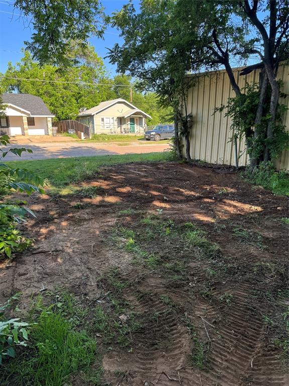 705 North Broadway Street, Unit R Wichita Falls, TX 76306 - Photo 8 of 16 a view of a house with a yard