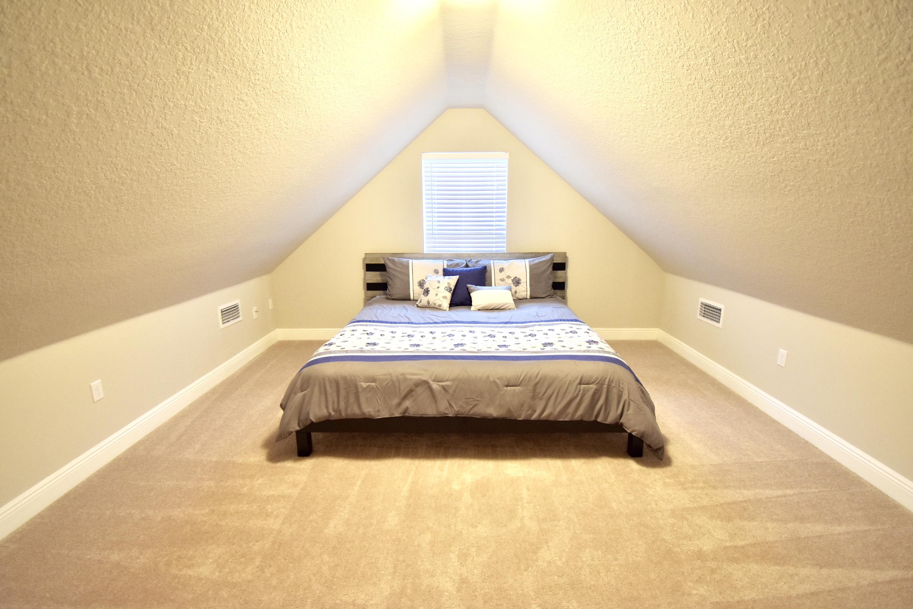 685 Cocobolo Drive Santa Rosa Beach, FL 32459 - Photo 14 of 16 a spacious bedroom with a bed and window