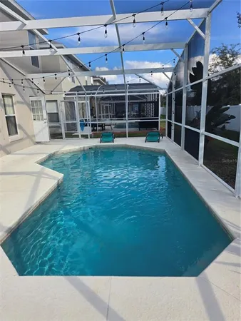 a view of a backyard with wooden floor