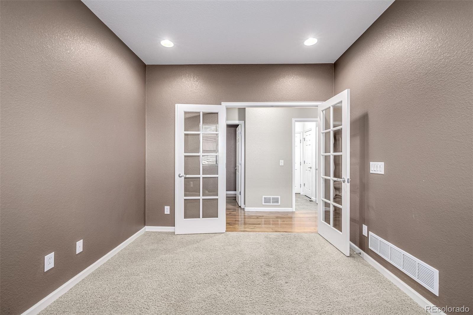 139 Muscovey Lane Johnstown, CO 80534 - Photo 22 of 49 an empty room with windows