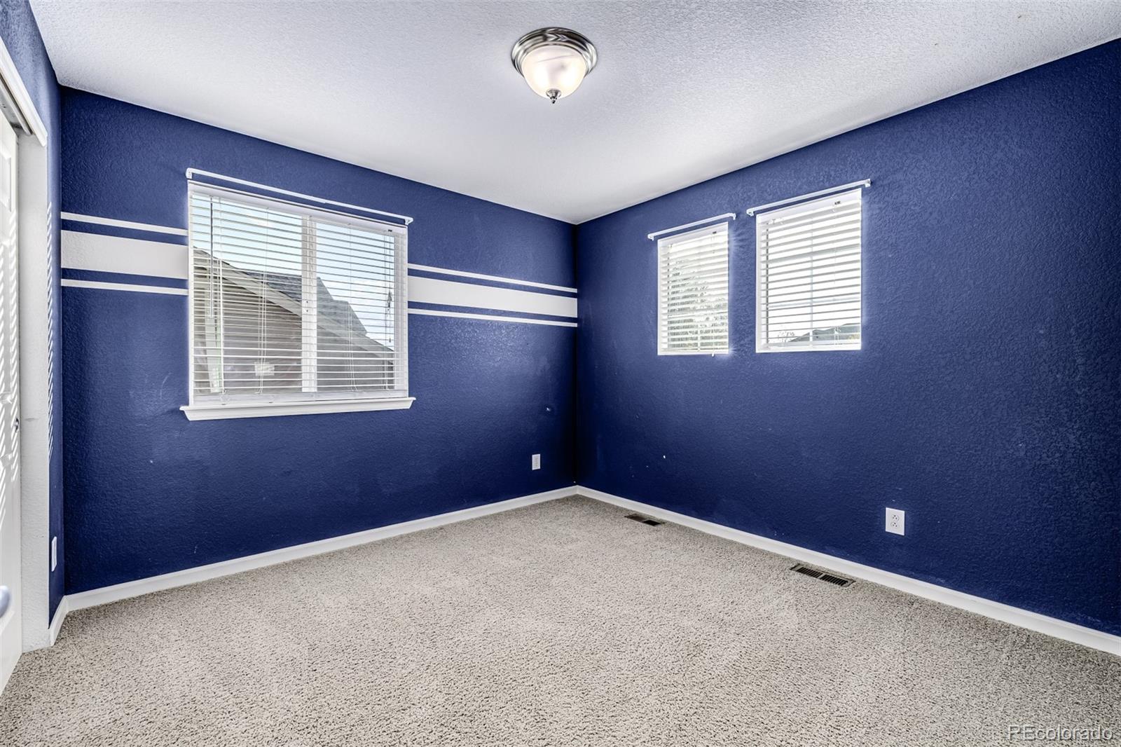 139 Muscovey Lane Johnstown, CO 80534 - Photo 25 of 49 a view of an empty room with a window