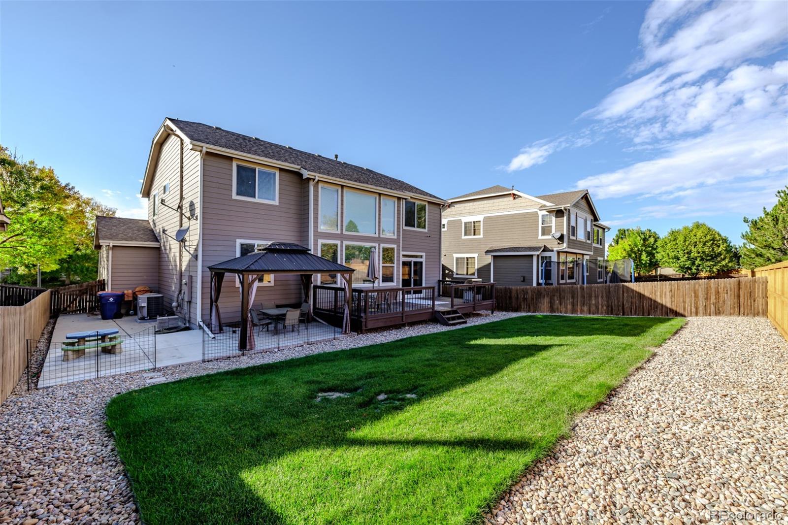 139 Muscovey Lane Johnstown, CO 80534 - Photo 32 of 49 a view of a house with a yard porch and sitting area