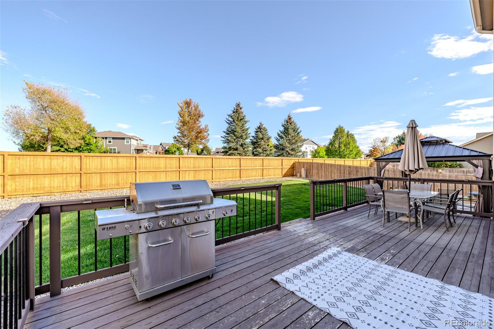 139 Muscovey Lane Johnstown, CO 80534 - Photo 35 of 49 a view of a terrace with sitting area