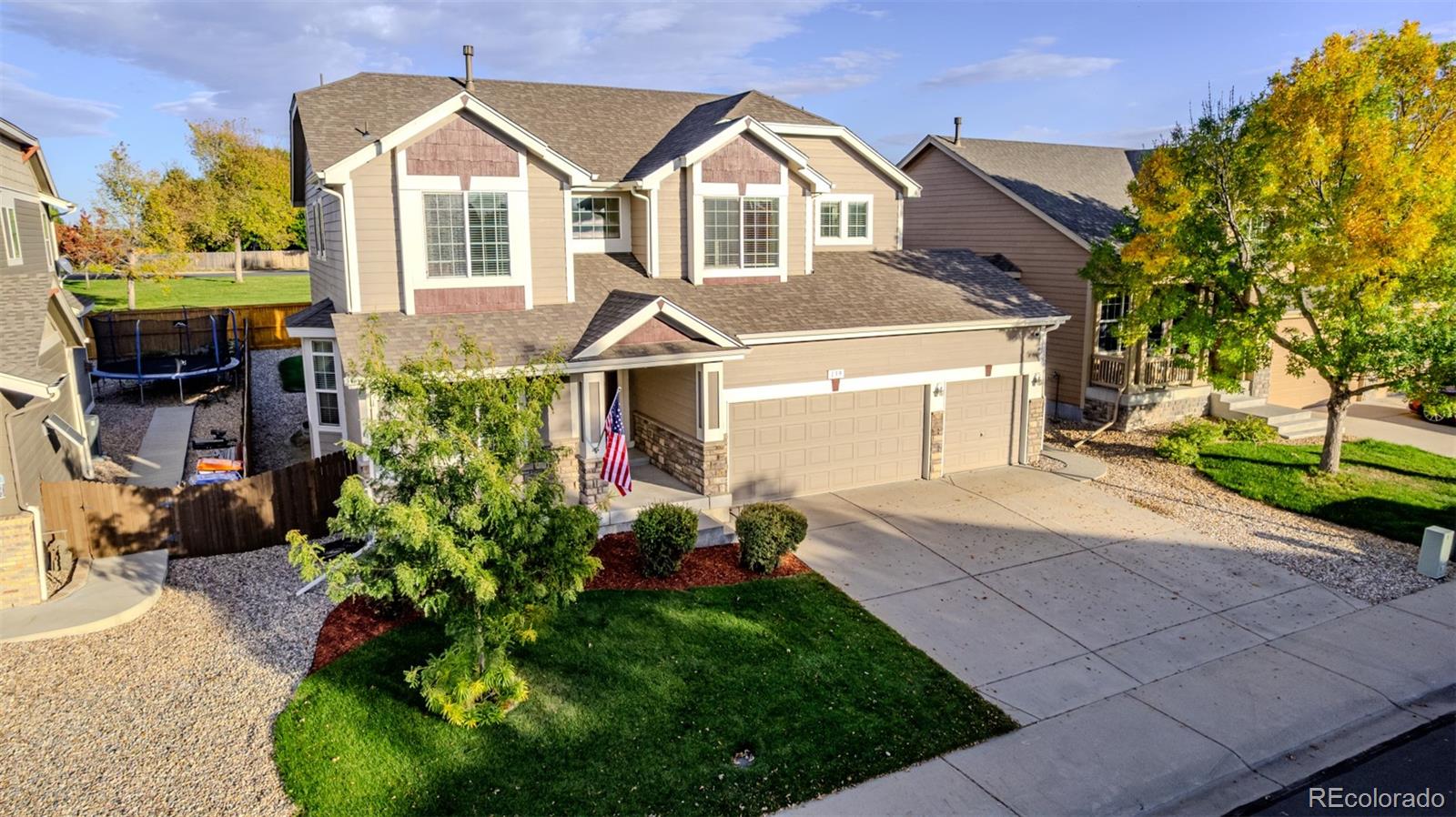 139 Muscovey Lane Johnstown, CO 80534 - Photo 42 of 49 a front view of a house with a garden
