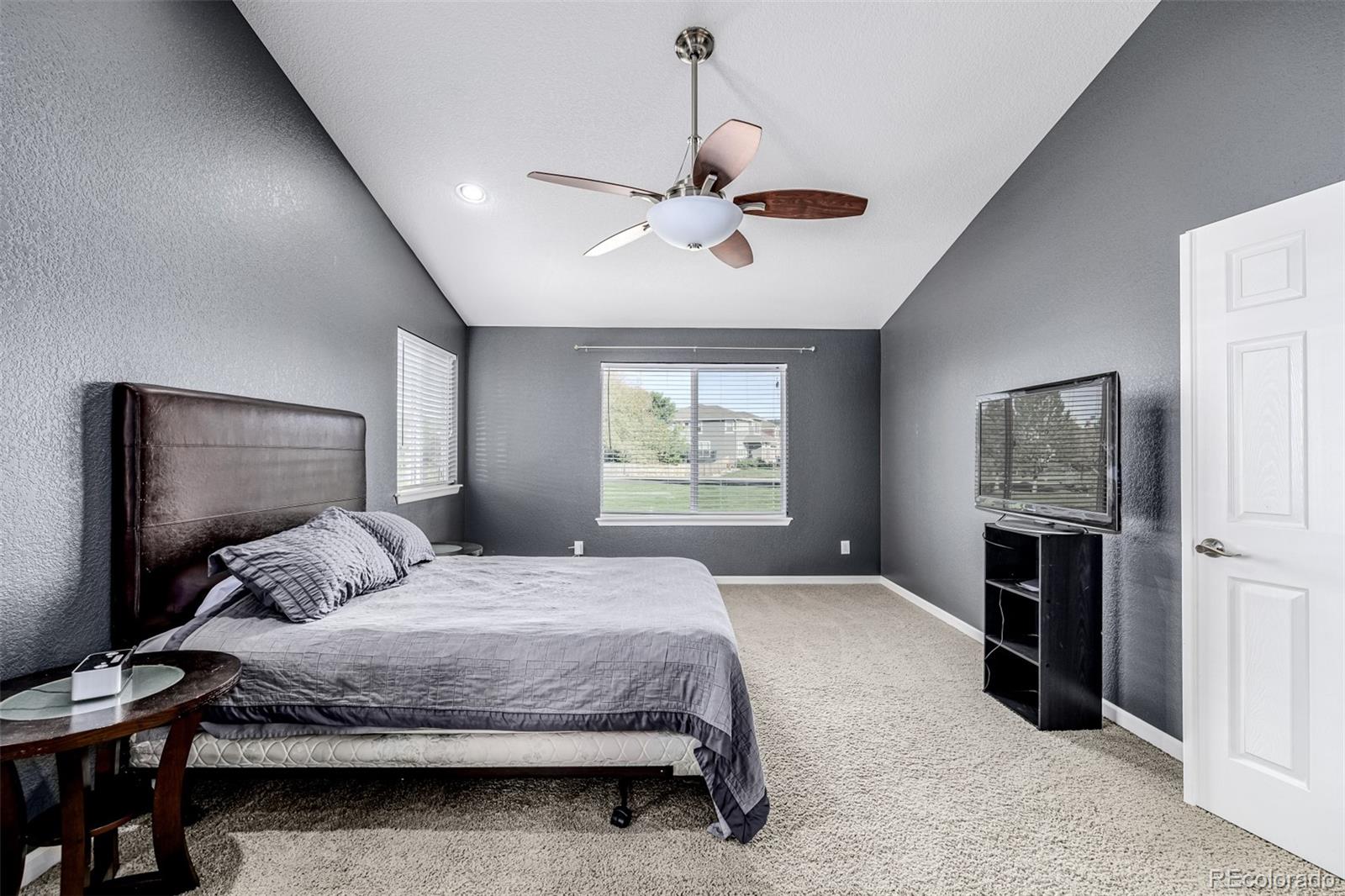 139 Muscovey Lane Johnstown, CO 80534 - Photo 46 of 49 a bedroom with a bed and a window