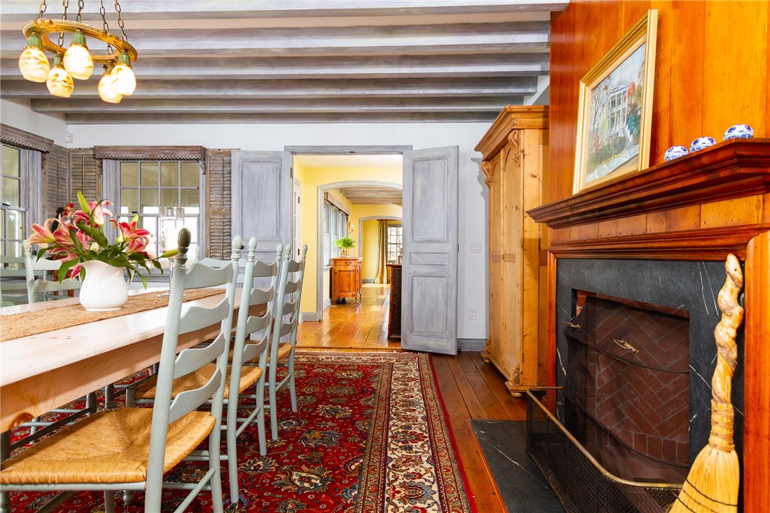 88 Cormorant Road Narragansett, RI 02882 - Photo 10 of 39 Formal dining room with wood burning fire place