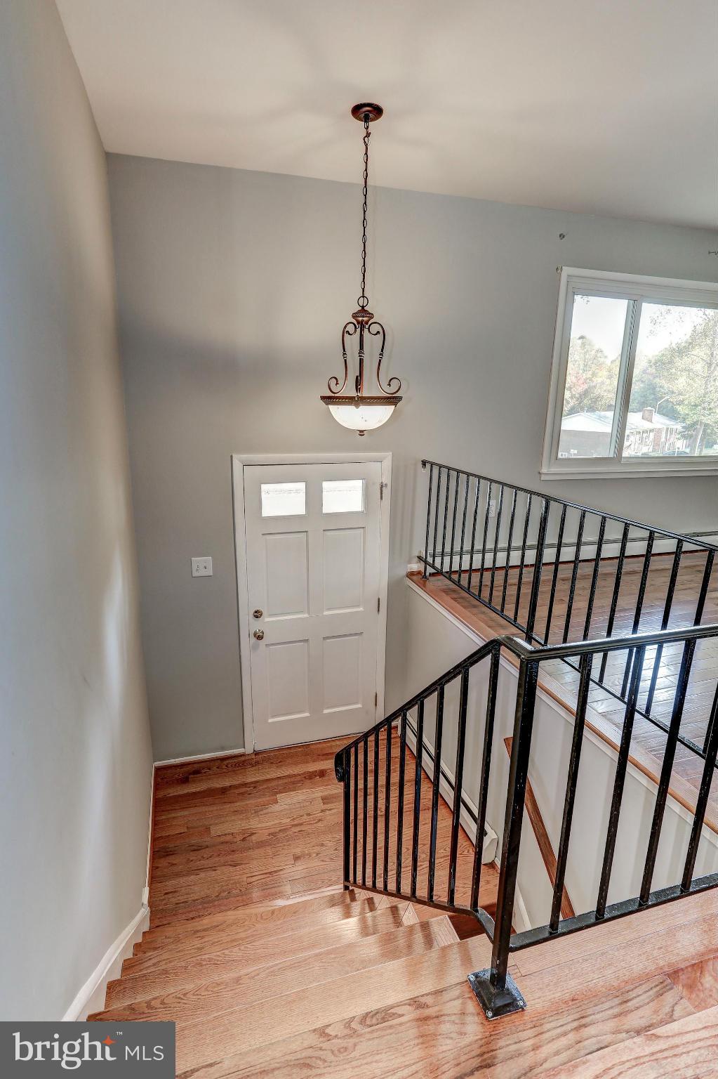 13818 Gilbert Road Woodbridge, VA 22193 - Photo 3 of 30 a view of entryway with wooden floor