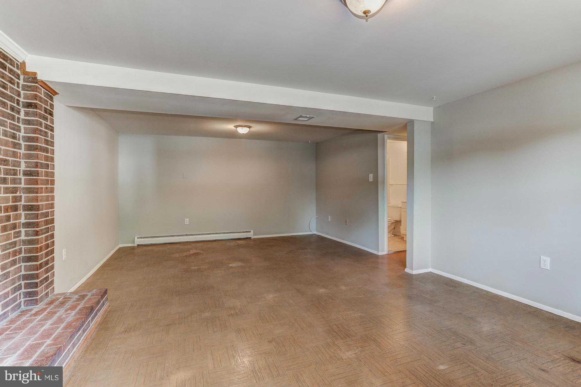 13818 Gilbert Road Woodbridge, VA 22193 - Photo 27 of 30 a view of an empty room with a window