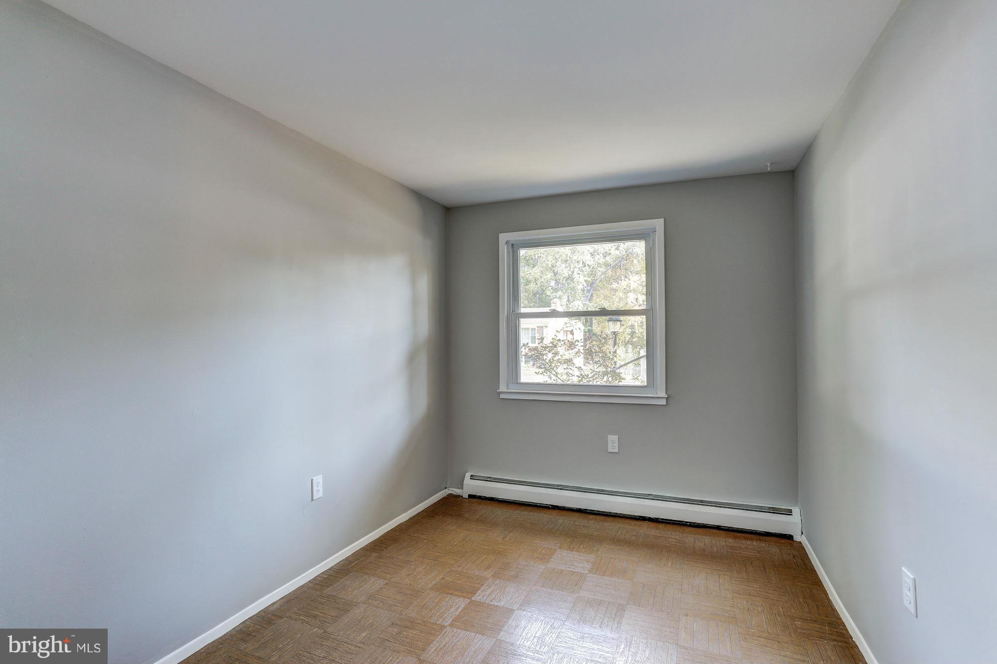13818 Gilbert Road Woodbridge, VA 22193 - Photo 29 of 30 an empty room with a window