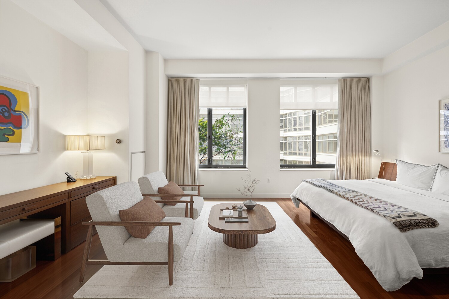 3 Morton Square Manhattan, NY 10014 - Photo 14 of 26 a spacious bedroom with a bed and a window