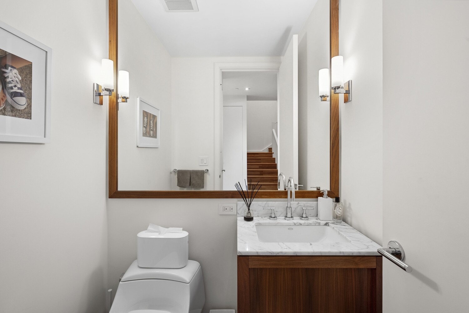 3 Morton Square Manhattan, NY 10014 - Photo 20 of 26 a bathroom with a toilet sink and mirror