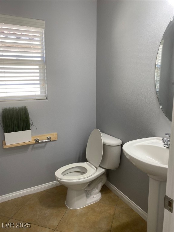 9541 Vast Valley Avenue Las Vegas, NV 89148 - Photo 21 of 32 Bathroom with light tile patterned floors and a textured wall