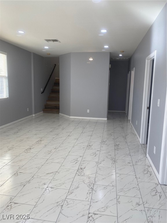 9541 Vast Valley Avenue Las Vegas, NV 89148 - Photo 24 of 32 Basement with light marble finish floors, stairs, and recessed lighting
