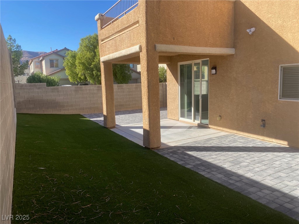 9541 Vast Valley Avenue Las Vegas, NV 89148 - Photo 3 of 32 View of yard with a patio
