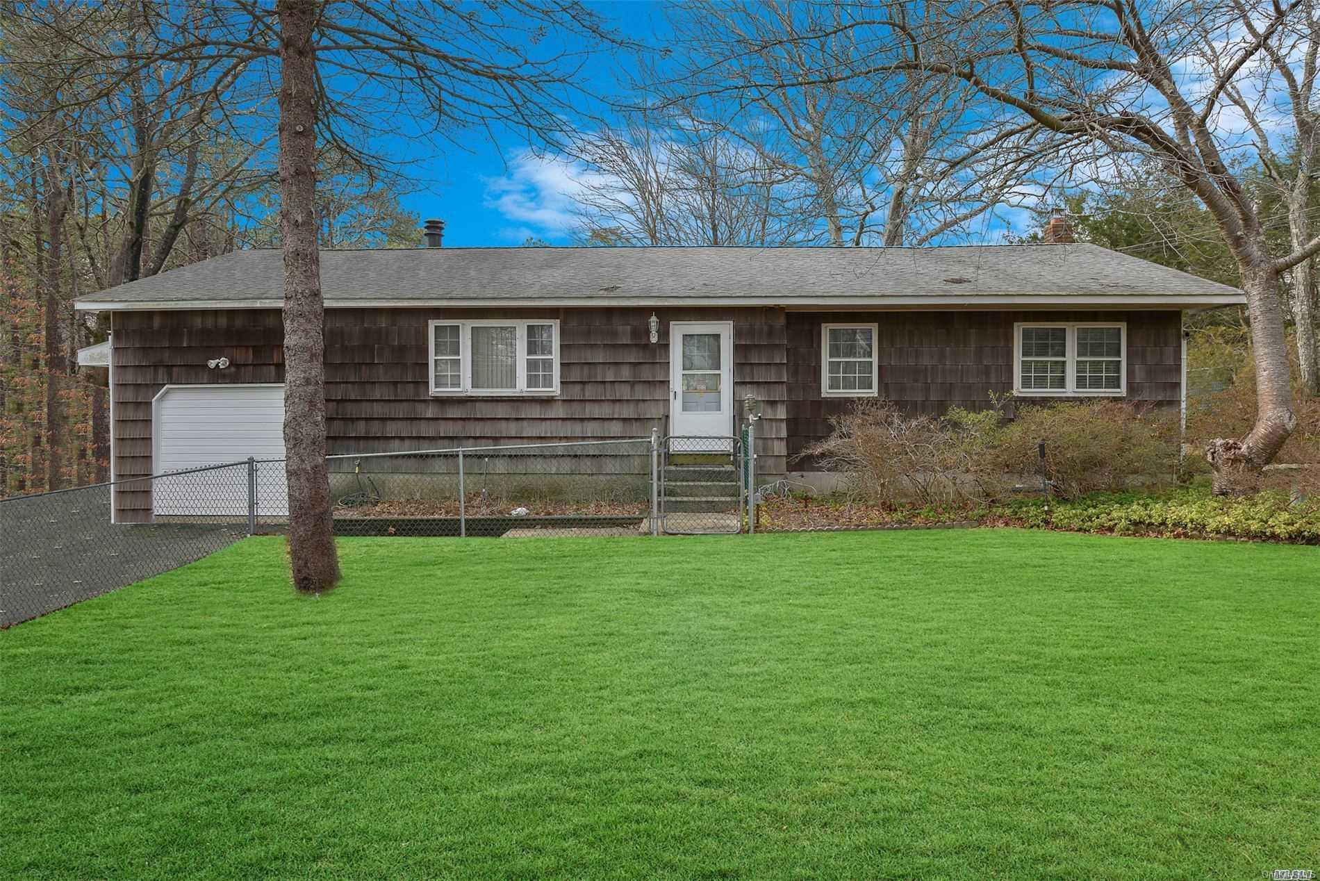 50 Old Saddle Road Ridge, NY 11961 - Photo 1 of 1 a front view of a house with garden