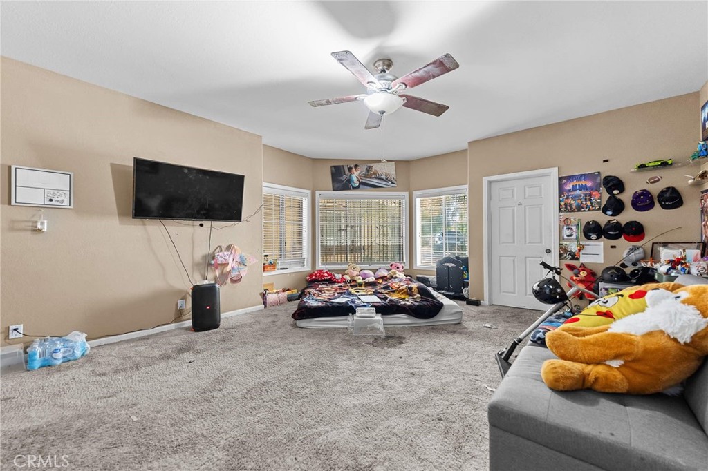 32245 Refa Street Wildomar, CA 92595 - Photo 13 of 35 a living room with furniture and a flat screen tv