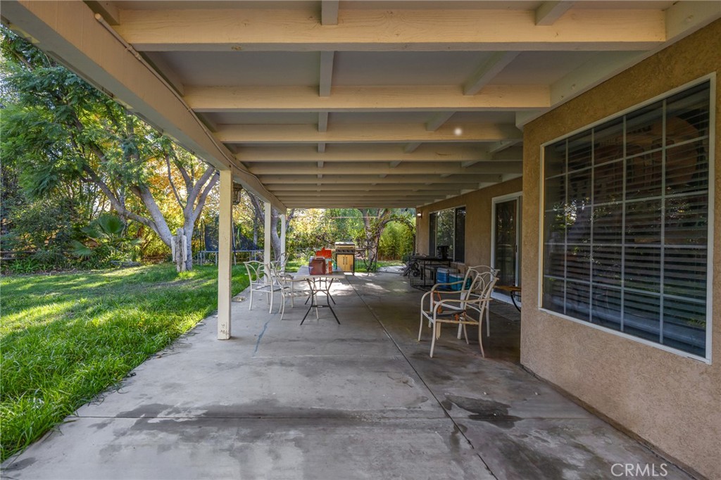 32245 Refa Street Wildomar, CA 92595 - Photo 19 of 35 a view of a porch with chairs and backyard