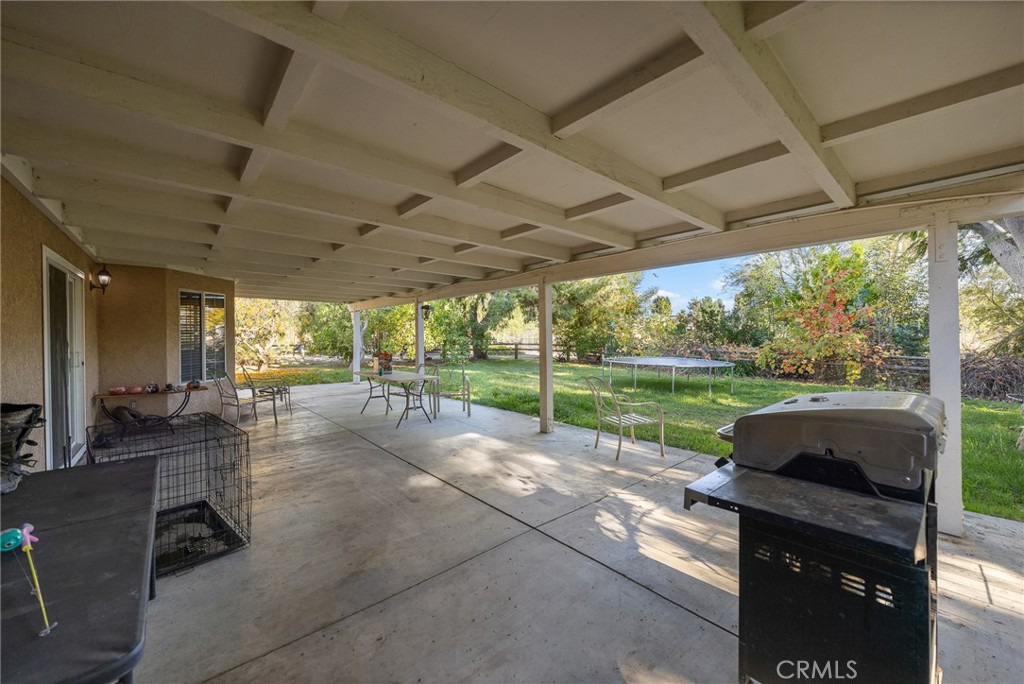 32245 Refa Street Wildomar, CA 92595 - Photo 21 of 35 a view of a patio with a backyard