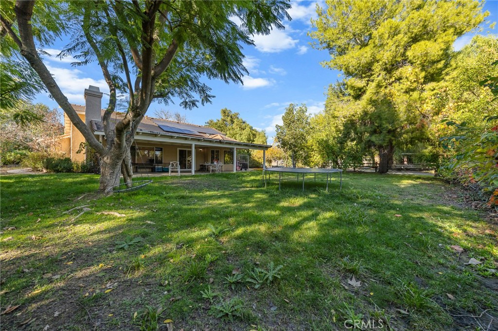 32245 Refa Street Wildomar, CA 92595 - Photo 7 of 35 a view of a house with a backyard