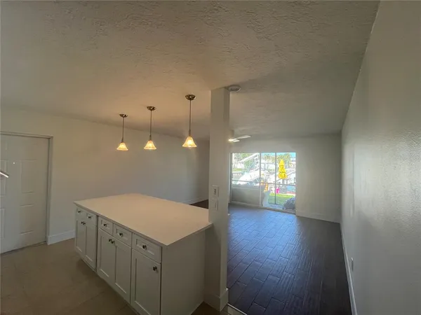 a bathroom with a sink a vanity and mirror