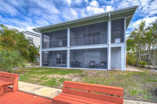 a view of a backyard with a garden and plants