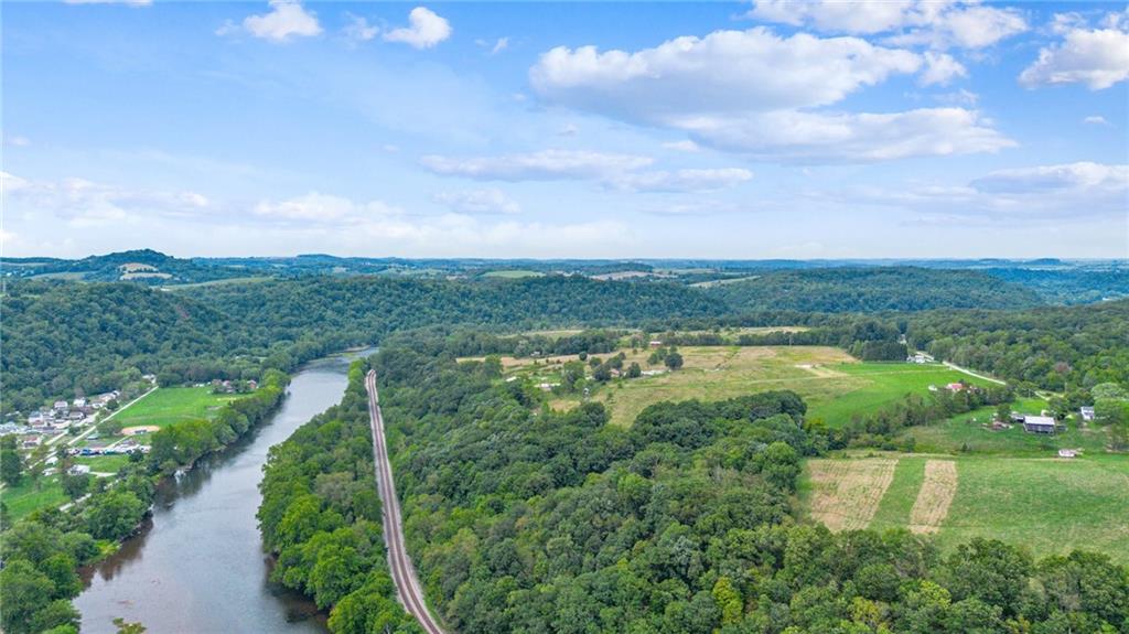 1663 Banning Road Dawson, PA 15428 - Photo 12 of 15 a view of a lake with a city