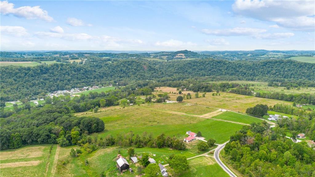 1663 Banning Road Dawson, PA 15428 - Photo 15 of 15 a view of a lake with a big yard
