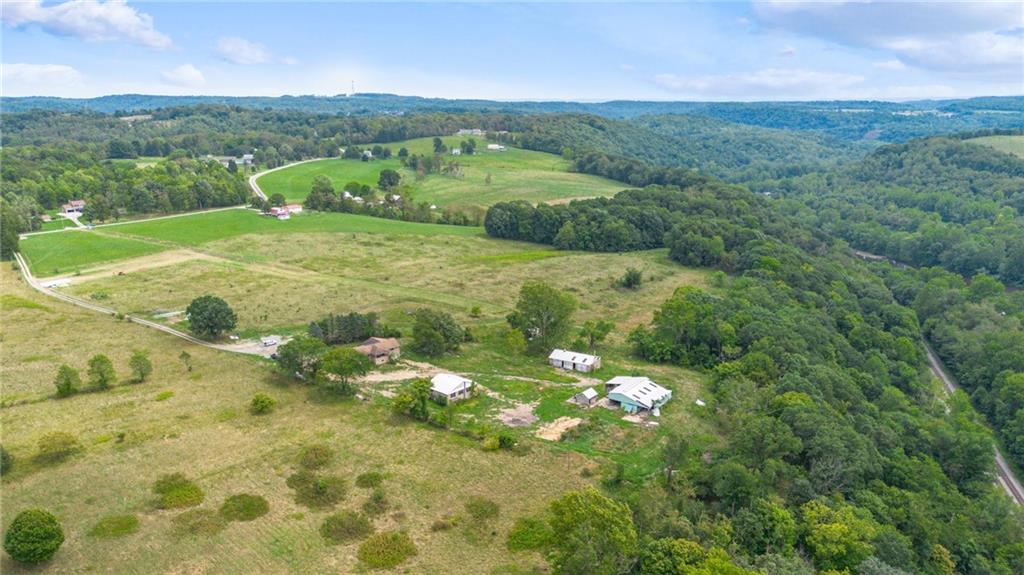 1663 Banning Road Dawson, PA 15428 - Photo 9 of 15 a view of a lush green field