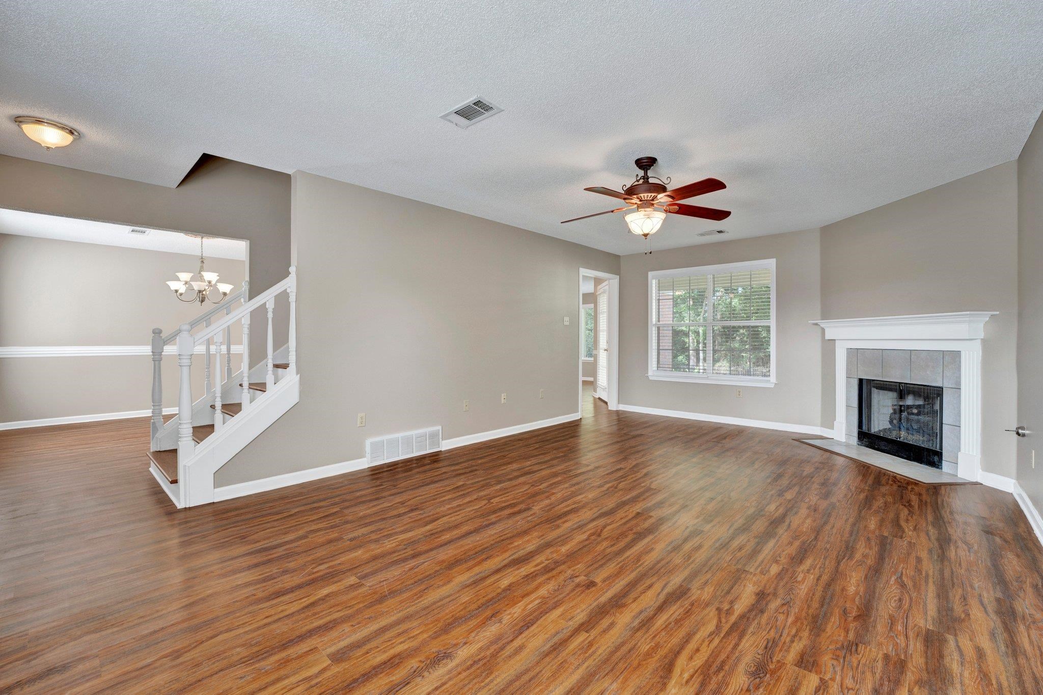 3735 Haynes Road Bartlett, TN 38133 - Photo 4 of 38 Luxury Vinyl Plank Flooring throughout home. Gas Fireplace