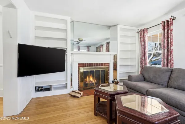 a bedroom with a bed and a table