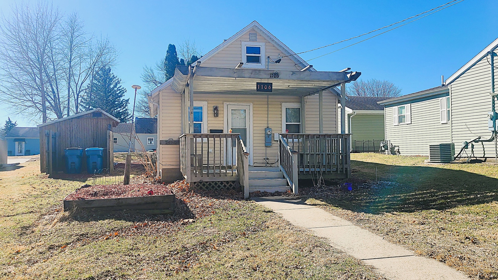 1106 Steinman Street Dixon, IL 61021 - Photo 1 of 14 a view of a house with a yard