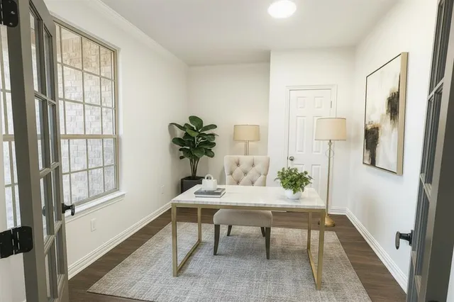 a view of a livingroom with furniture and window