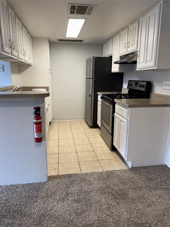 4747 Allendale Road, Unit 38 Houston, TX 77017 - Photo 4 of 9 a kitchen with a sink a refrigerator and cabinets