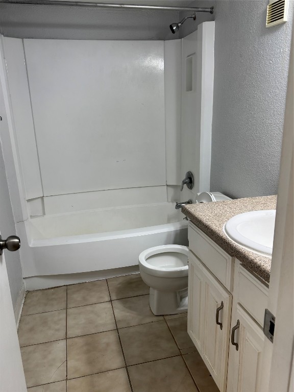 4747 Allendale Road, Unit 38 Houston, TX 77017 - Photo 6 of 9 a bathroom with a granite countertop toilet a sink and bathtub