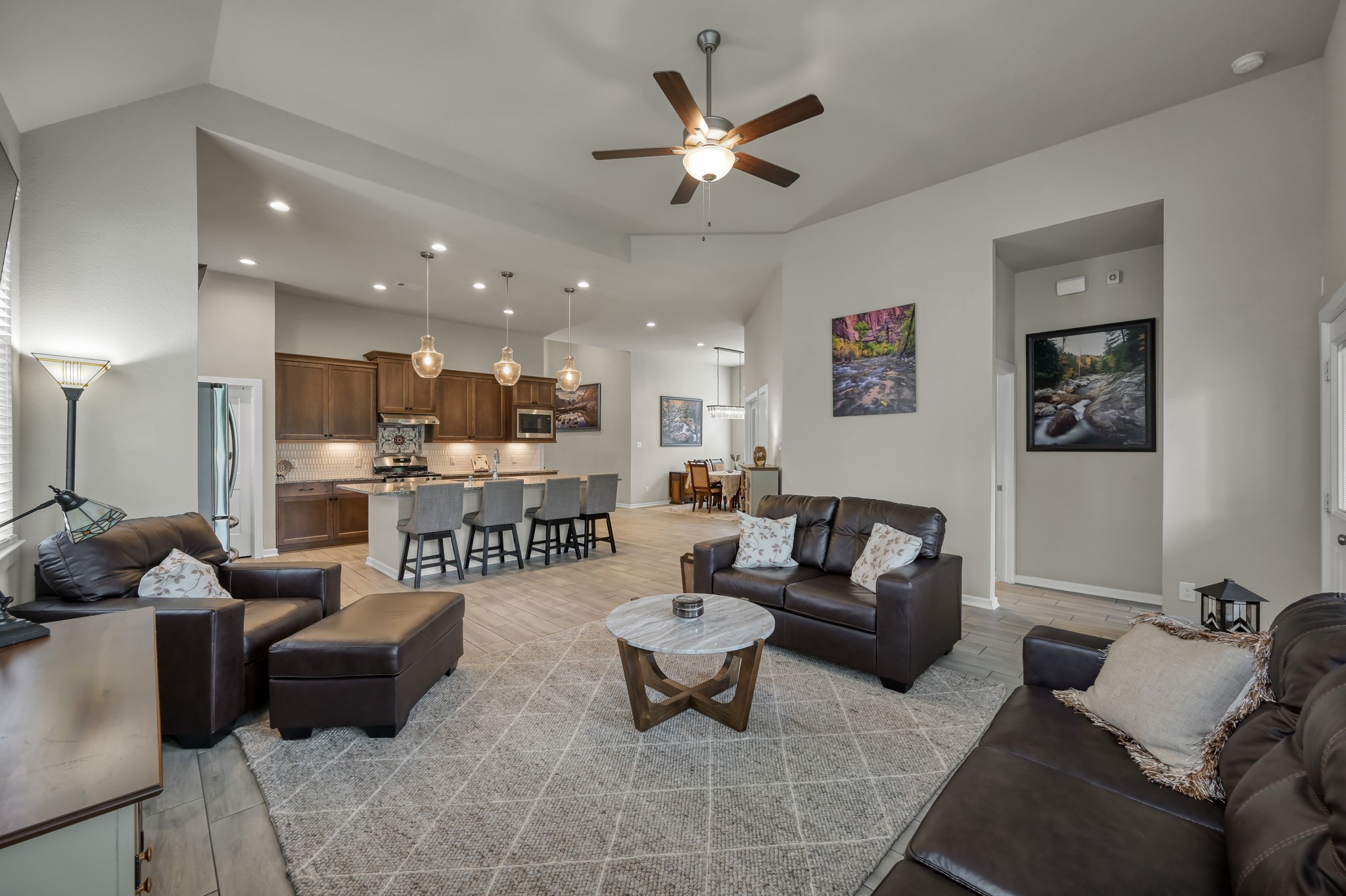 111 Yellow Perch Way Conroe, TX 77318 - Photo 10 of 35 Open-concept family room designed for gatherings and everyday living.