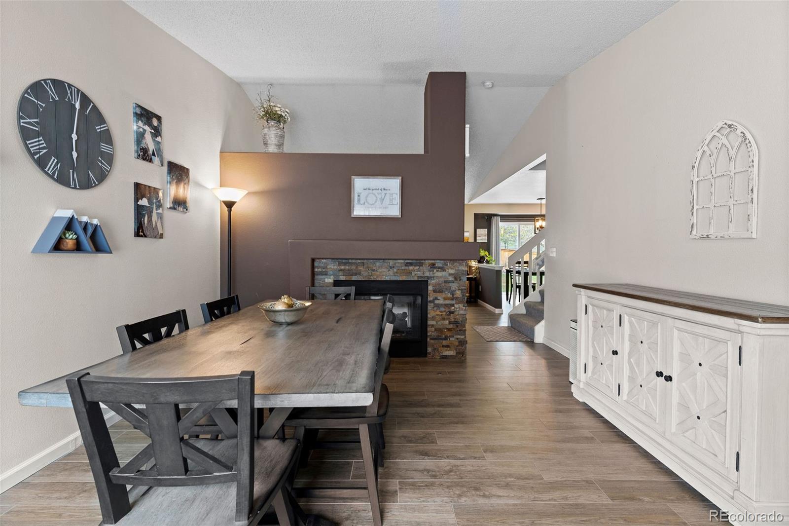 10565 Hyacinth Place Highlands Ranch, CO 80129 - Photo 4 of 33 a view of a dining room with furniture