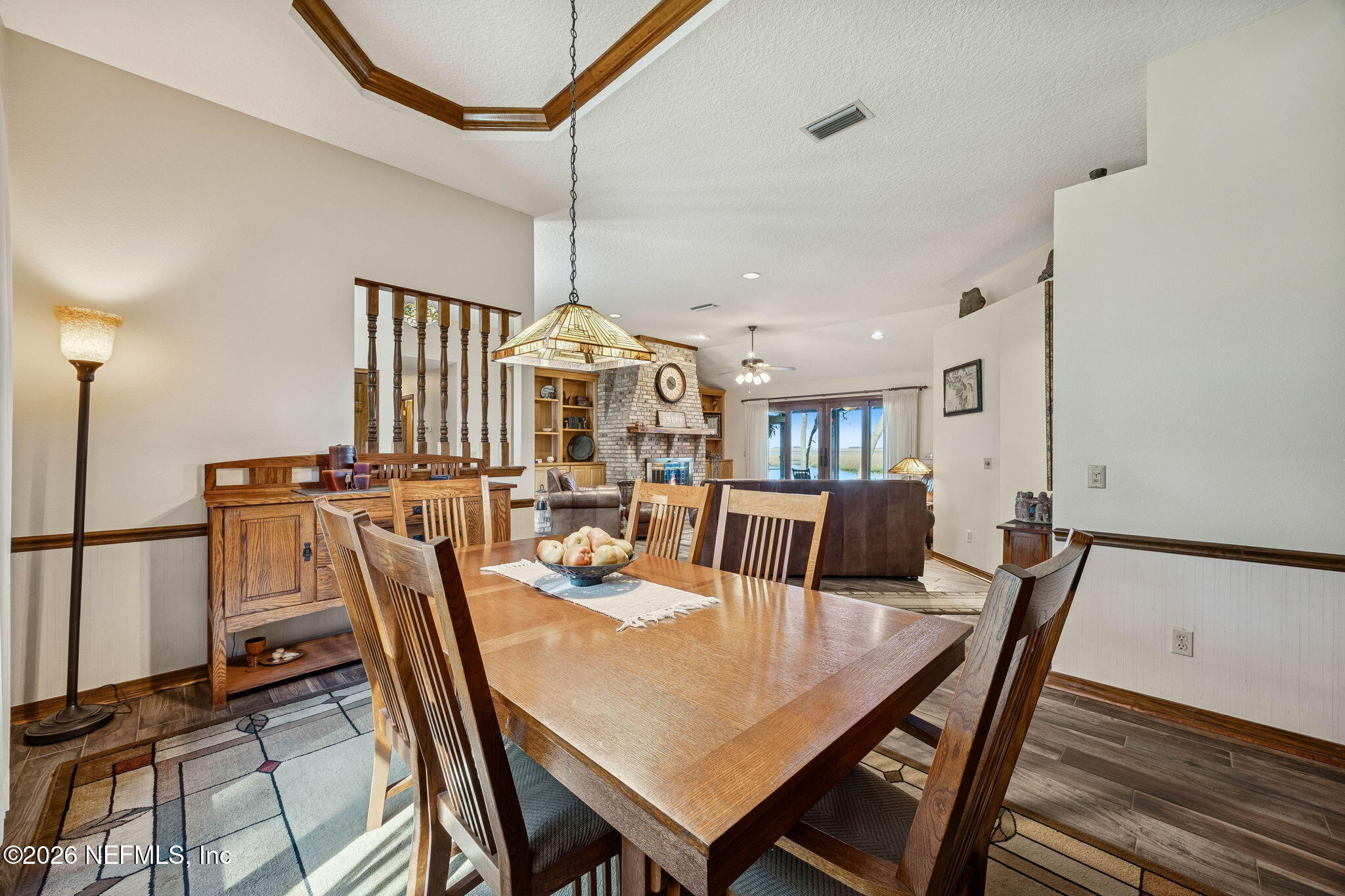 97146 Pirates Point Road Yulee, FL 32097 - Photo 16 of 74 a view of a dining room with furniture
