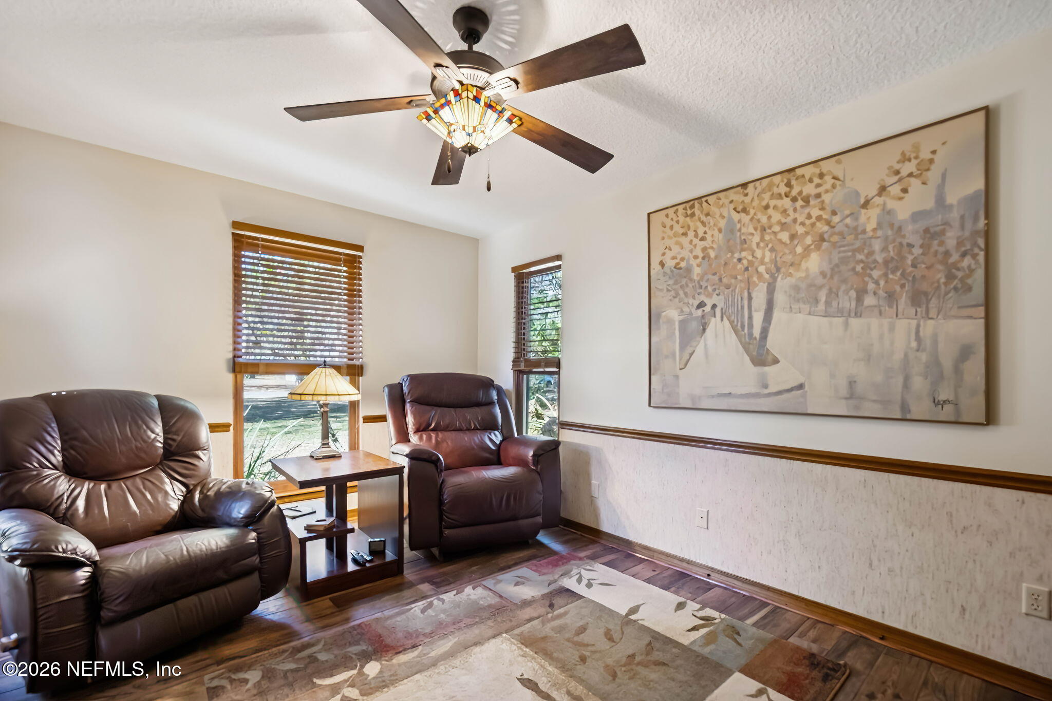 97146 Pirates Point Road Yulee, FL 32097 - Photo 31 of 74 a living room with furniture and a window